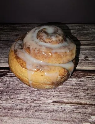 A glazed sourdough sweet roll